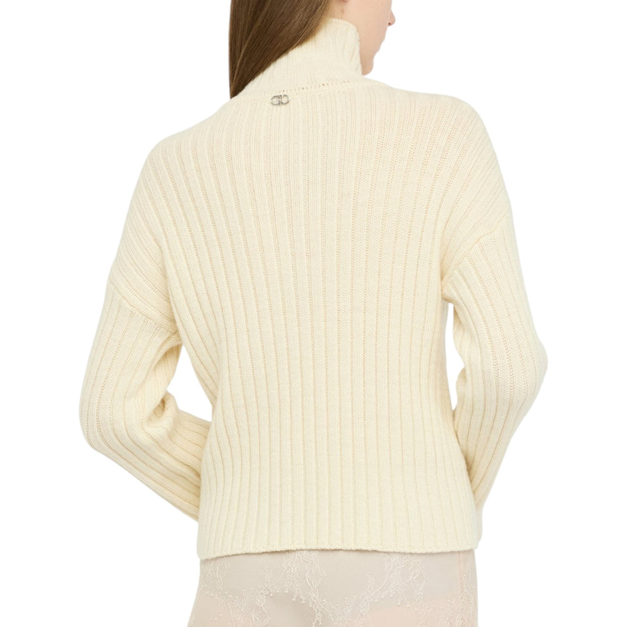 Dolcevita donna in lana con bottoni gioiello