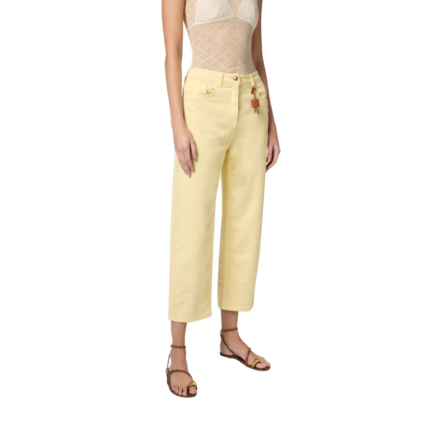 Jeans donna  in cotone tinto con charm logato
