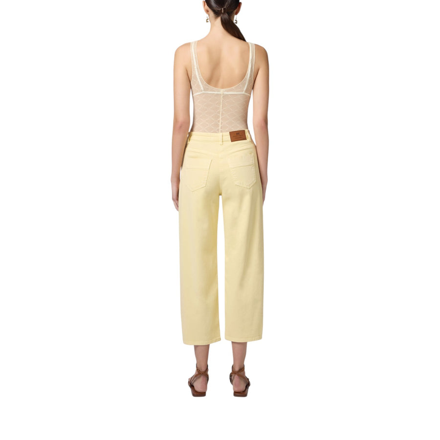 Jeans donna  in cotone tinto con charm logato