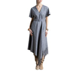 Abito midi asimmetrico check con frange