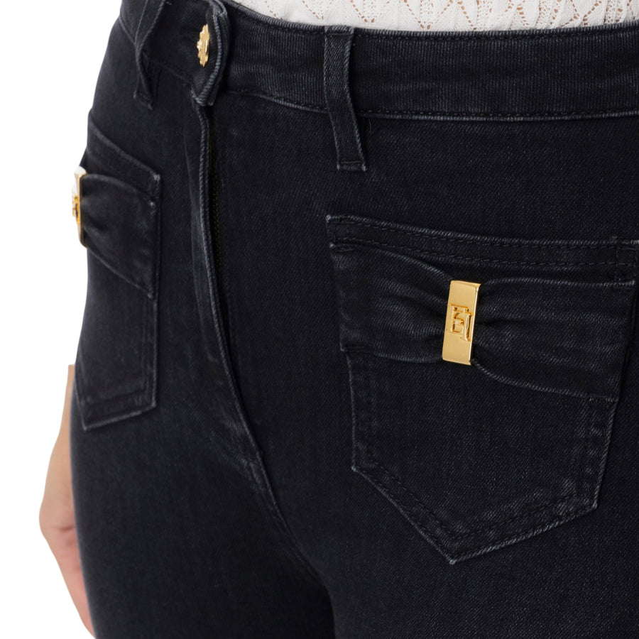 Jeans donna  con taschini e dettagli a fiocco