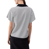 Polo donna a righe con bottoni gioiello