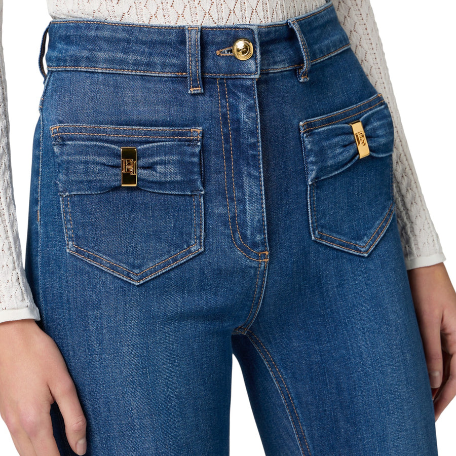 Jeans donna  con taschini e dettagli a fiocco