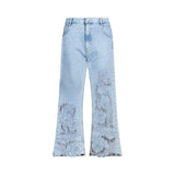 Jeans donna con ricami traforati