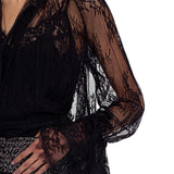 Blusa donna in pizzo con fiocco e volants