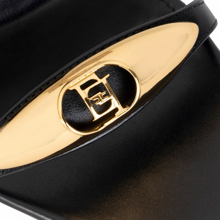 Sandalo donna  in nappa con placca