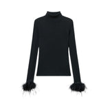 Maglia donna in lana a coste con piume