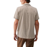 Polo uomo con logo all-over