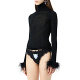 Maglia donna in lana a coste con piume