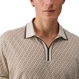 Polo uomo con logo all-over