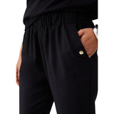 Pantaloni donna slim fit con risvolto