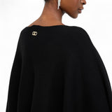 Poncho donna con frange e borchie