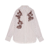 Camicia donna a righe con ricami floreali