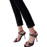 Pantaloni donna skinny con risvolto e strass