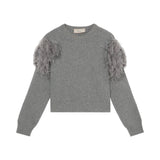 Maglia donna in lana a coste con piume