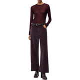 Pantaloni donna cropped in velluto con cintura in pelle