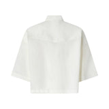 Camicia donna cropped con dettagli metallici