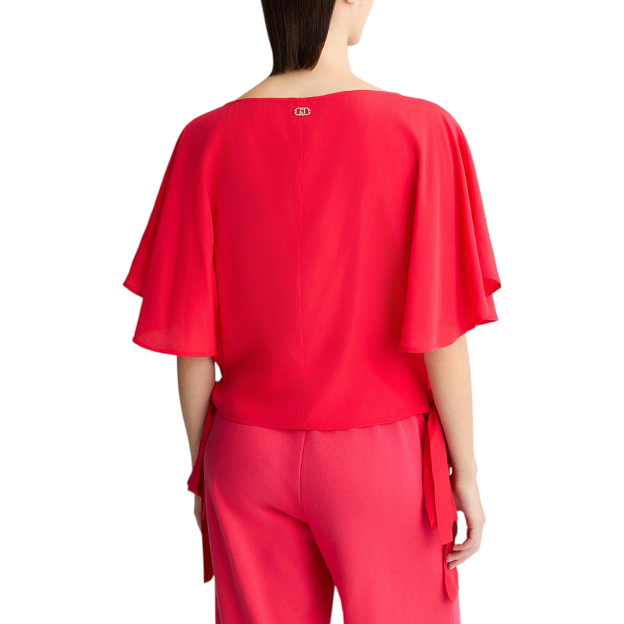 Blusa donna con fiocchi