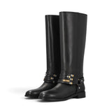 Stivali con fibbie in pelle