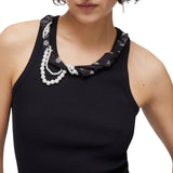 Top donna con dettagli gioiello