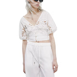 Top donna in cotone con ricamo floreale