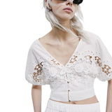 Top donna in cotone con ricamo floreale