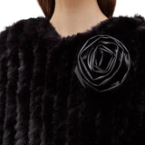 Poncho donna in faux fur con spilla