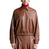 Camicia di ecopelle con elastico.