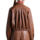 Camicia di ecopelle con elastico.