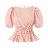 Top donna cropped con volant e schiena scoperta