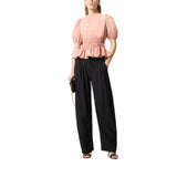 Top donna cropped con volant e schiena scoperta