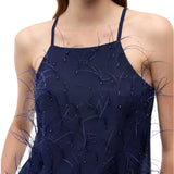 Top donna fluido con piume