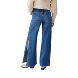 Jeans donna flare con spacchetti laterali