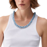 Top donna con dettagli gioiello