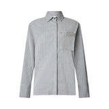 Camicia donna gessata con borchie