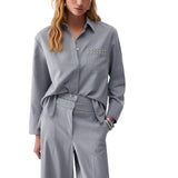 Camicia donna gessata con borchie