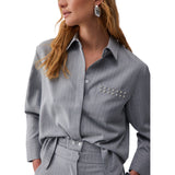Camicia donna gessata con borchie