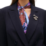 Blazer donna a righe con dettaglio gioiello sul bavero