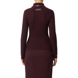 Polo donna in maglia bouclé con dettagli in vinile