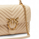 Borsa donna a mano e tracolla media Love Bag Puff in nappa chevron