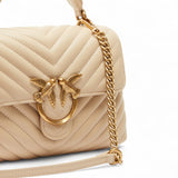 Borsa donna a mano piccola Love Bag Puff in morbida nappa matelassé