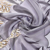 Foulard grande con fiocco