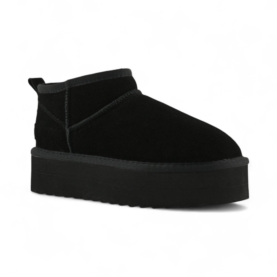 Stivale donna invernale con suola platform in pelle scamosciata