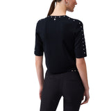 Top donna in maglia con borchie