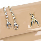 Pochette donna Fly in vernice con catena