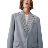 Blazer donna gessato con borchie