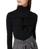 Maglione donna in misto lana con fiocchi in velluto