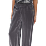 Pantaloni flare laminati