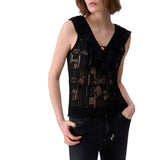 Top donna in pizzo con volant