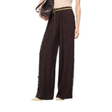 Pantaloni donna palazzo con motivo floreale e banda in pizzo